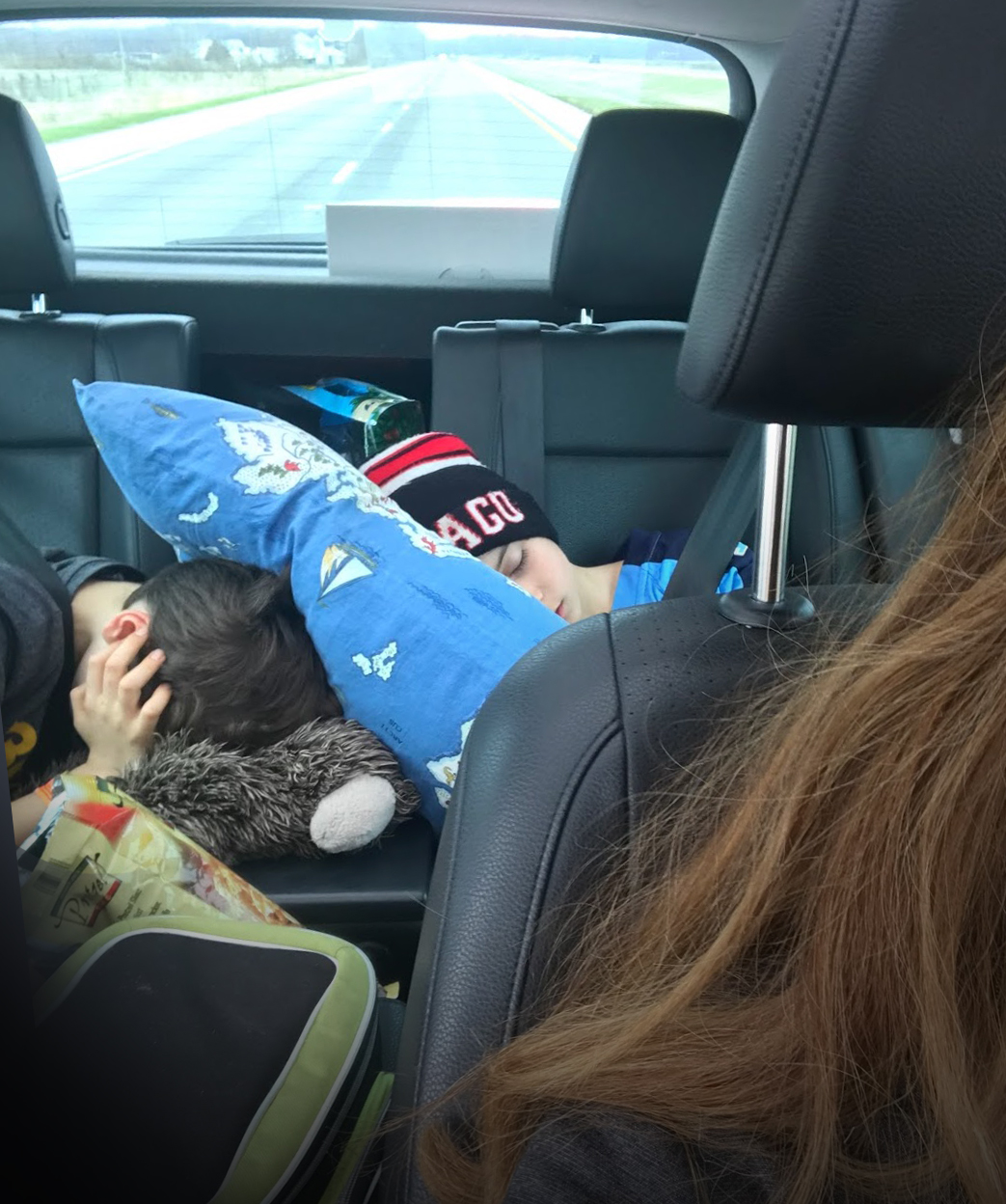 https://thefamilybackpack.com/wp-content/uploads/2018/05/road-trip-sleeping.jpg